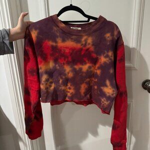 Tie-dye purple and red cropped pullover sweatshirt